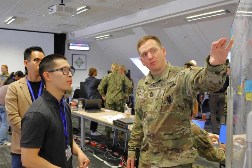 More than 250 data scientists, coders and developers referred to as “hackers,” gathered to develop prototypes within set timeframes to initiate and validate innovative concepts in Stuttgart Germany, June 7, 2024. BRAVO Hackathons, sponsored by senior Department of Defense leaders, foster innovative environments where government and industry collaborate to test bold ideas using real DOD data. (U.S. Army photo by Staff Sgt. Aaron Daugherty)