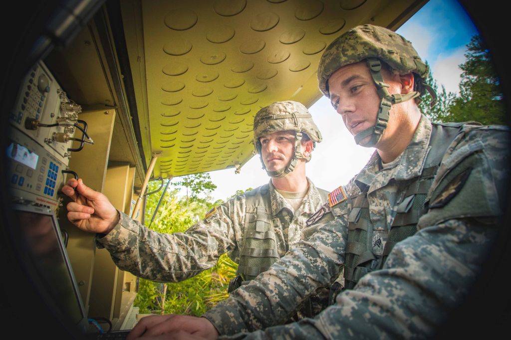 Soldiers troubleshoot a satellite transportable terminal during the Best of the Best Competition at Camp Blanding Joint Training Center, Fla., May 21, 2016. Soldier communication capability will one day be augmented with signals from the national defense space architecture, which the Space Development Agency is developing.