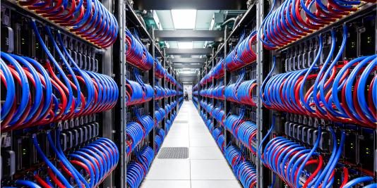 Spanning eight rows and occupying the space of two professional basketball courts, Aurora is one of the largest supercomputer installations to date. (Image by Argonne National Laboratory.)