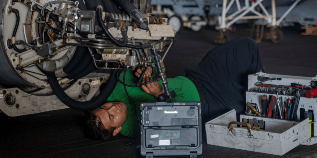 ARABIAN GULF (Dec. 6, 2023) Aviation Machinist's Mate 3rd Class Carlos Avalos conducts maintenance on an aerial refueling store aboard the aircraft carrier USS Dwight D. Eisenhower (CVN 69) in the Arabian Gulf, Dec. 6, 2023. The Dwight D. Eisenhower Carrier Strike Group is deployed to the U.S. 5th Fleet area of operations to support maritime security and stability in the Middle East region (source:  NAVAIR).