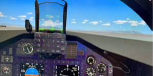 Shown is a T-45C prototype mixed reality cockpit view. Note: Dials, displays, and out-of-the-cockpit view are virtual images while the cockpit panels and buttons are seen in the “real world” via a video pass-through camera.