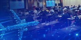 digital airplane superimposed over conference meeting